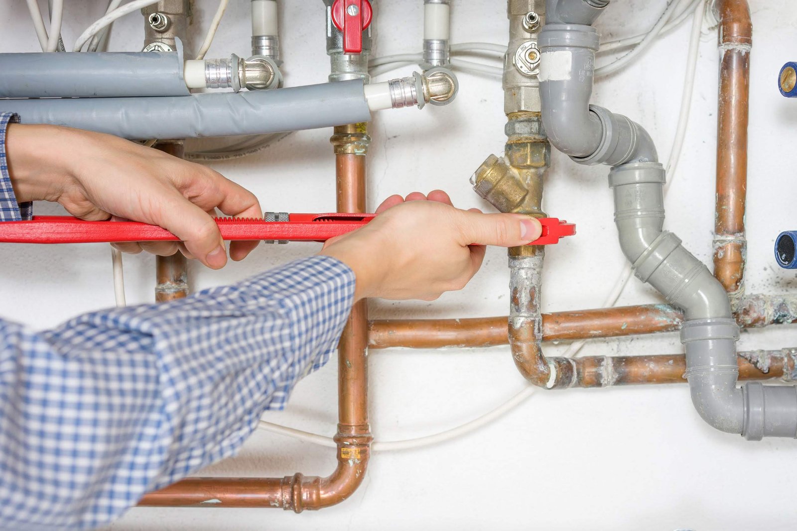 36086350 plumber fixing central heating system